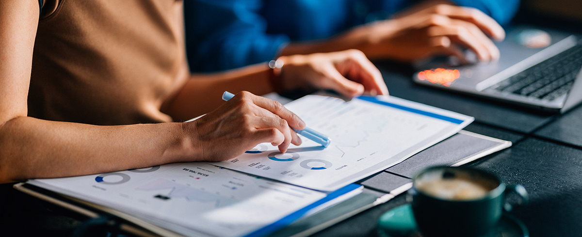 Broker helping client compare dental plans